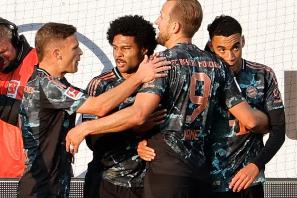 Kane brilha com hat-trick e Bayern goleia o Kiel para manter 100% na Bundesliga